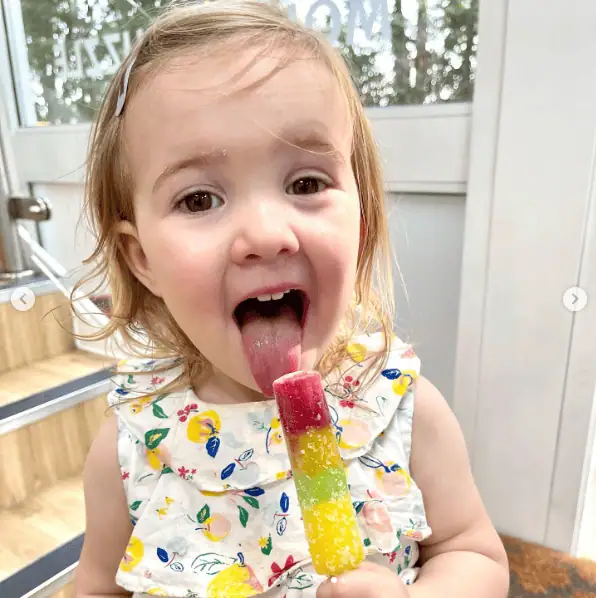nursery children enjoying ice lollies